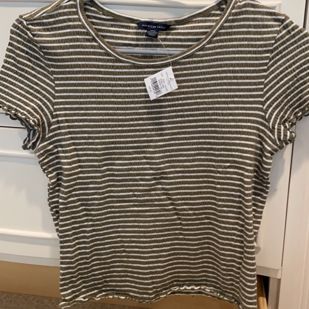 green and white striped tee shirt